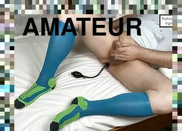Playing with cock and ass in blue compression socks