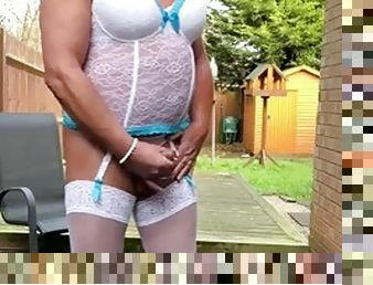 Amateur shemale Kellycd2022 sexy milf outdoors masturbating my big cock sissy in white basque and stockings