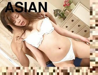 Seductive oriental babe tittyfucks fat cock