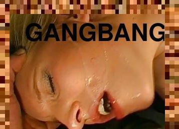 Wild babe in gang bang action