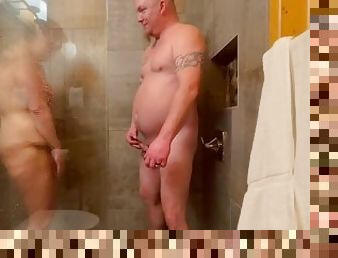 Husband fucks slutty wife in shower while new friend waits his turn