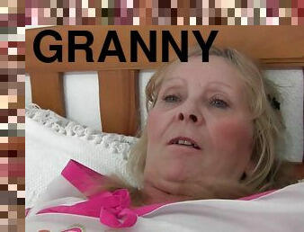 Granny with big tits gets finger fucked by photographer