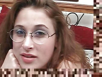 Hot slut gets jizzed all over her glasses