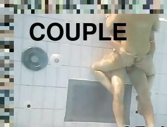 Couples have fun with amateur sex in the public pool