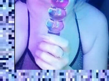 Sensual blowjob on a glass dildo