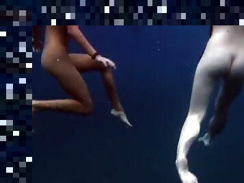 Submerged hot babes underwater