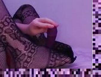 I give my dildo a footjob in sexy fishnet stockings