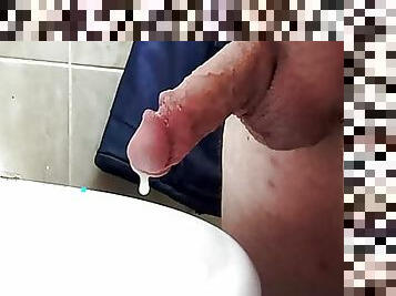 Self-pleasuring with latex gloves in WC