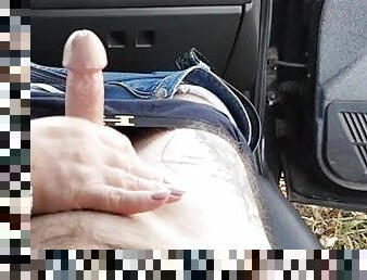 jerking off a dick in the car close up