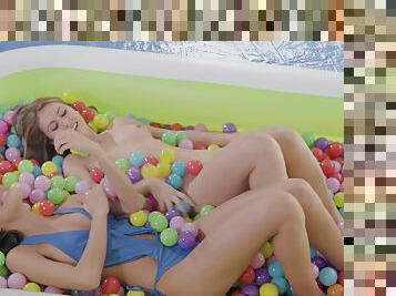 Hot girls Emily Willis and Paige Owens hook up in a fun ball pit
