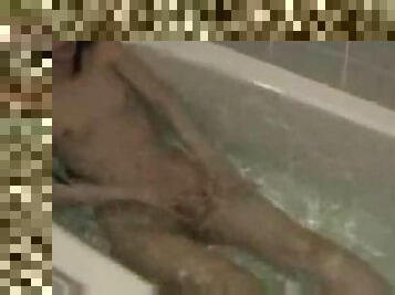 Japanese girl in warm bath water masturbating