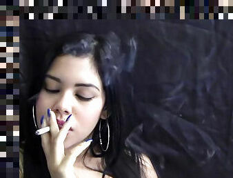 Latina is smoking a cigarette so sexy