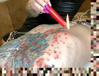 Hot Wax Games! Dominatrix pours wax on slave's body