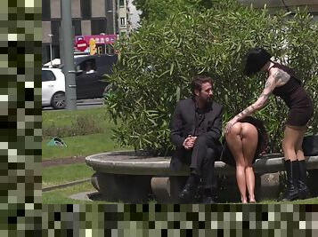 Outdoor sexual fun in the park with a couple and their slave girl