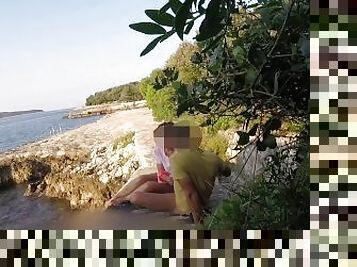 Teen teacher sucks my cock in a public beach in Croatia in front of everyone - it's very risky