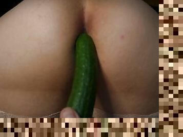An amateur MILF is training her ASS with a cucumber and then is being ass fucked and creampied
