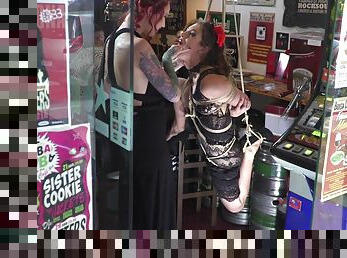 Lesbian whore endures nasty bondage moments at the shop