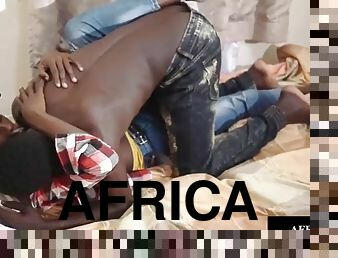 African twink jerks off his cock while getting nailed