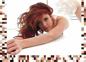 Redhead Elle Alexandra is fingering her cute pussy with pleasure