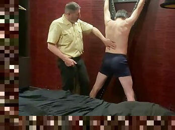 Tied up and spanked by French-Top-Biker in my tennis shorts