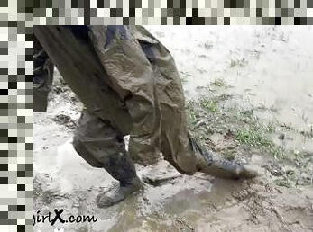 Muddy Girl in Mud Fields, Rainsuit in the Rain