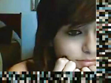 Cute girlfriend is posing on the webcam