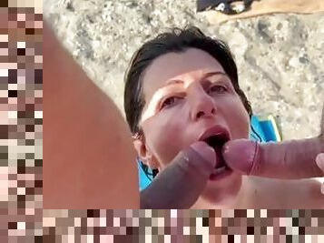 In the nudist beach two voyeurs use my slutty wife in all holes, she thanks and swallows
