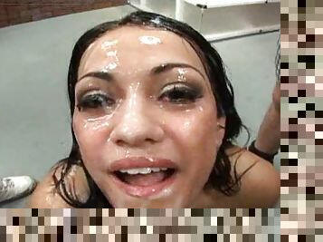 Girl takes a ton of cum on her face