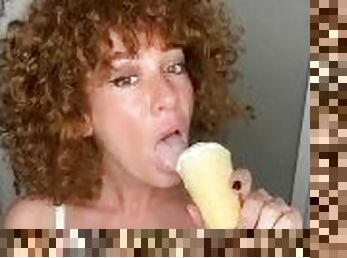 Mommy Playing with ice-cream on her lips and dreaming about your cum