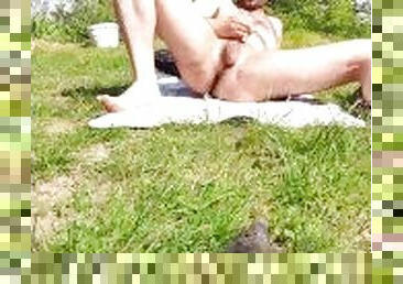 Horrny Exhibitionist Jerks and Stretches While Sunbathing in Public Forest