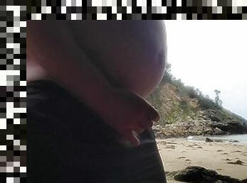 Masturbating on the beach