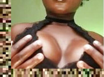 ebony slut shows her big pointy tits