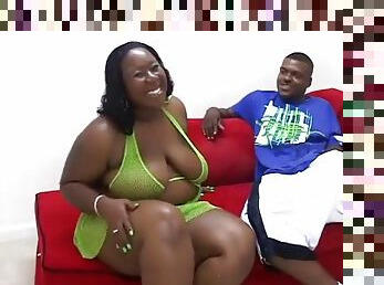 Black stud bangs a big black beauty on the couch