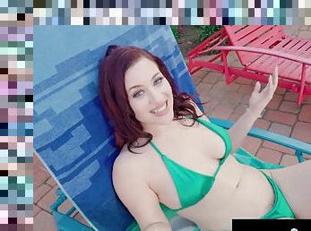 Gorgeous busty redhead MILF blows guy by the pool