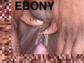 Ebony spreading pink pussy