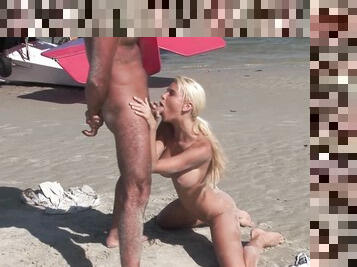 Lovely blonde tries sex by the beach with one of the hot locals