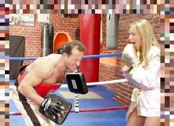 Blonde babe Francesca Felucci gives a hit on the crotch of her boxing coach