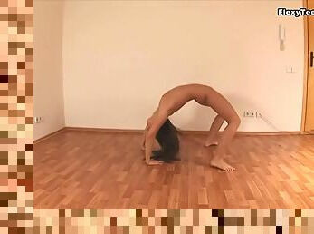 Tanned gal gets naked and shows flexibility